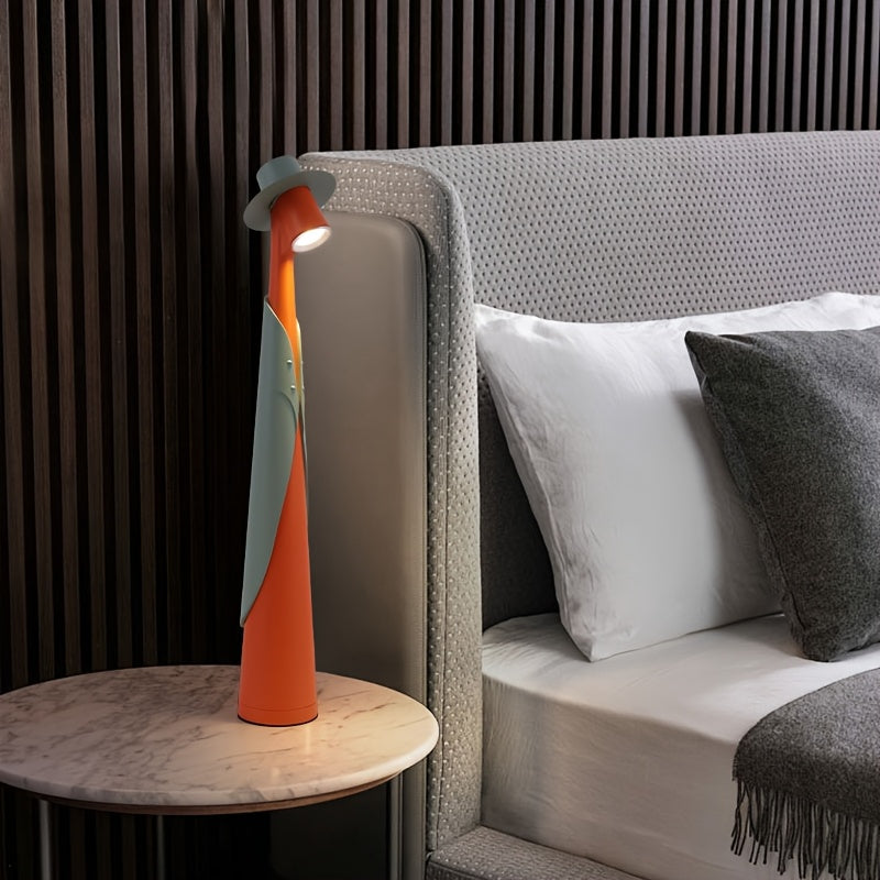 Lámpara de mesa escultórica con silueta de sombrero, recargable y con control táctil