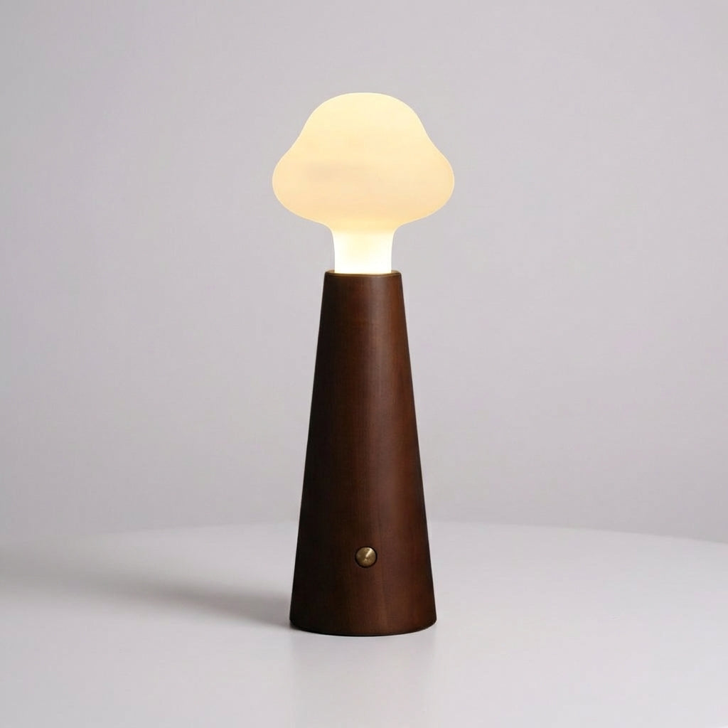Lámpara de mesa con pantalla acrílica en forma de nube, base cónica y luz difusa
