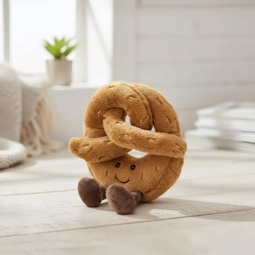 Juguete de peluche y cojín abrazable con forma de tostada de pretzel y cruasán redondeado
