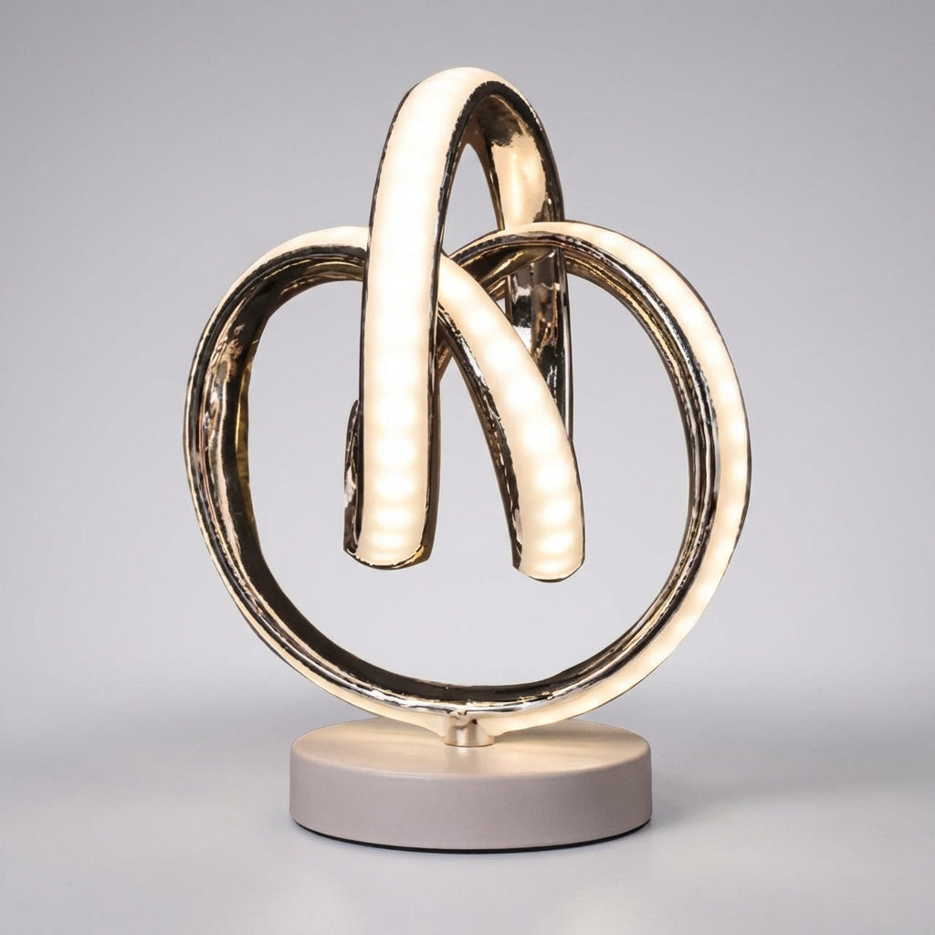 Lámpara de mesa decorativa escultural de aluminio y acrílico con bucle curvado