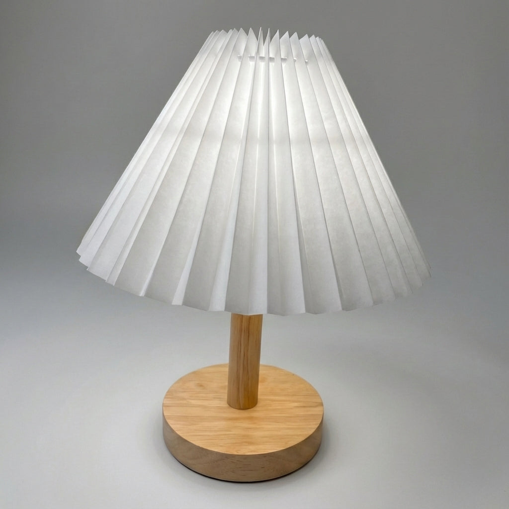 Lámpara de mesa escultural con pantalla plisada plegable, base de madera y batería recargable