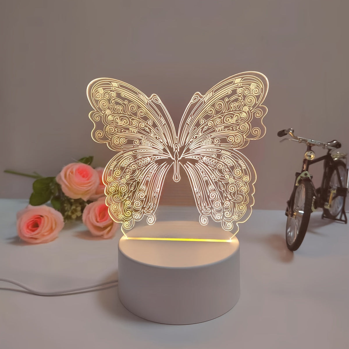 Lámpara de mesa moderna geométrica con recorte de mariposa, alimentación USB