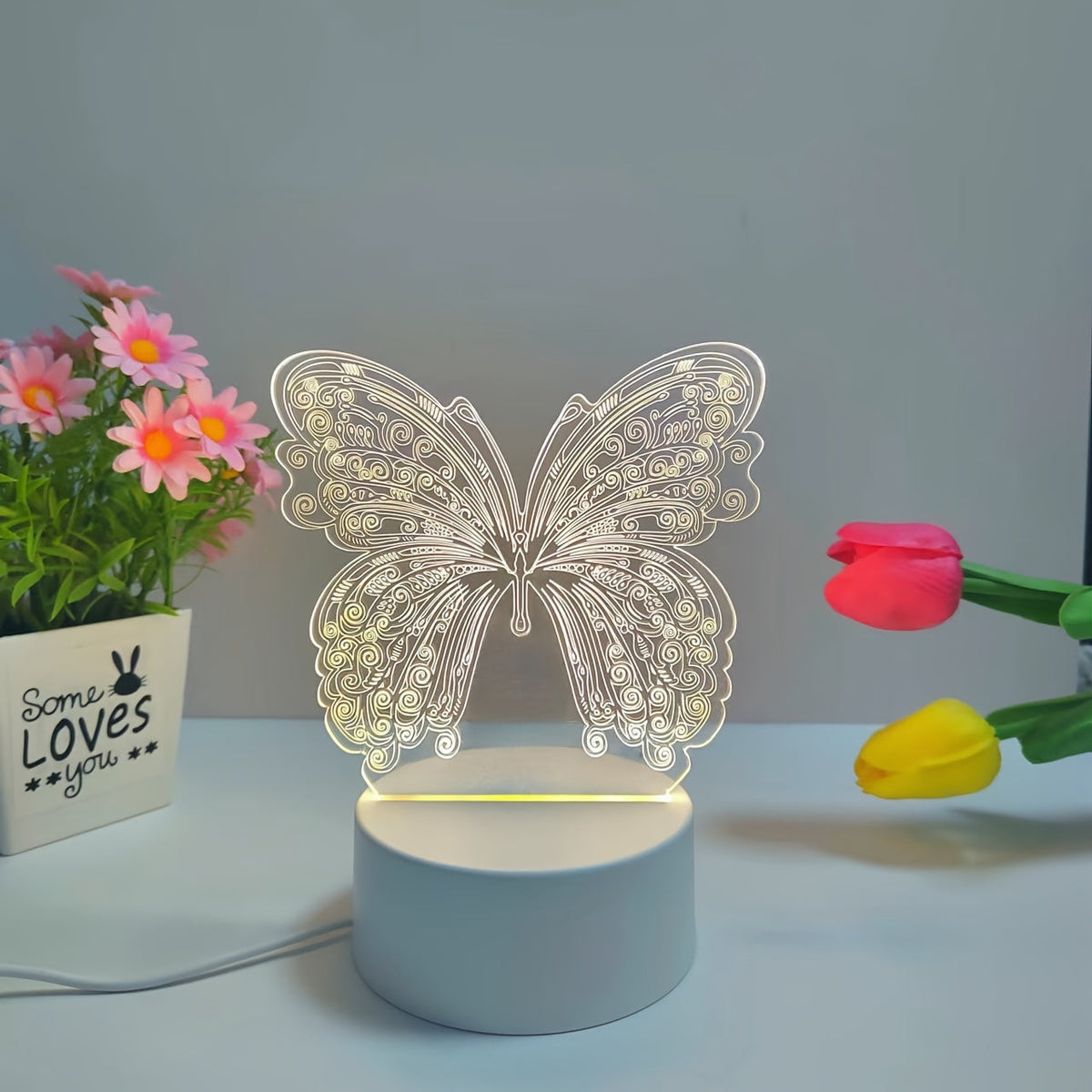Lámpara de mesa moderna geométrica con recorte de mariposa, alimentación USB