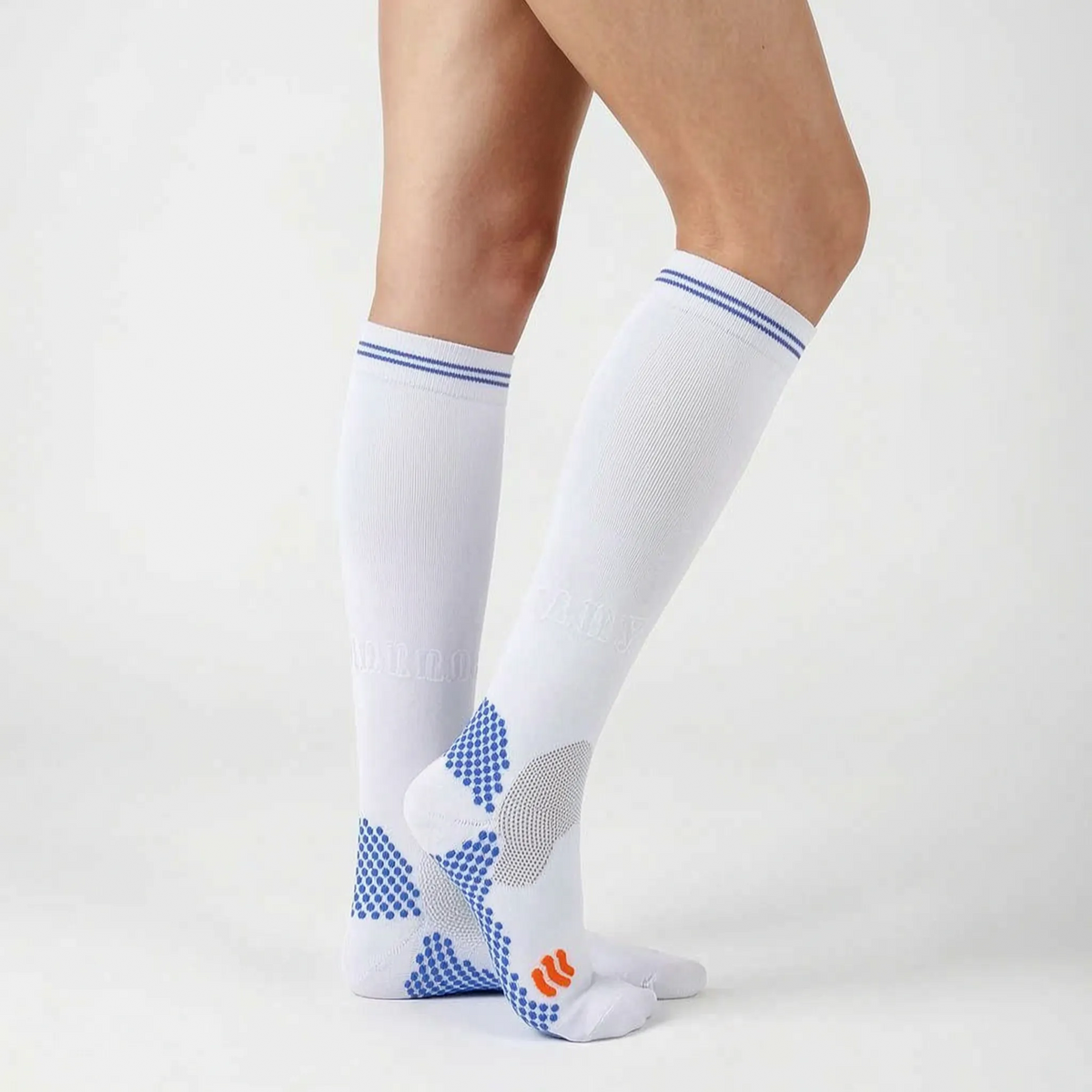 Calcetines deportivos de compresión hasta la rodilla, con tejido por zonas y parte superior acanalada