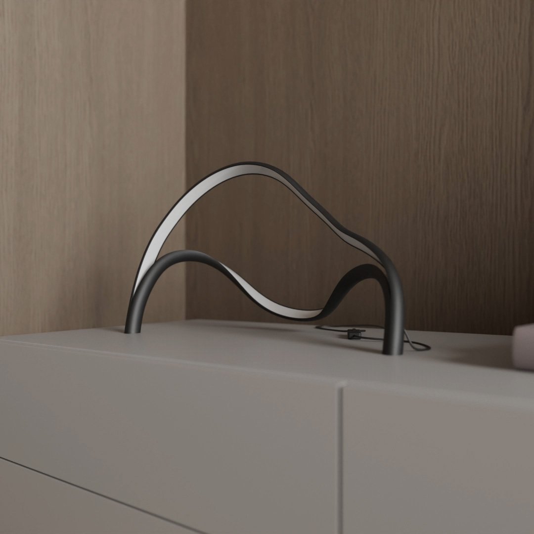 Lámpara de mesa compacta de metal y acrílico con silueta escultural
