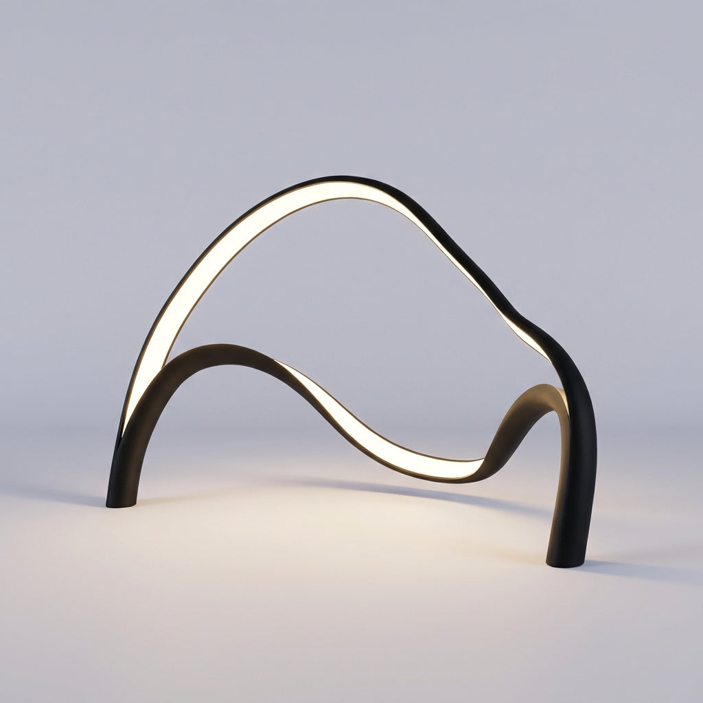 Lámpara de mesa compacta de metal y acrílico con silueta escultural