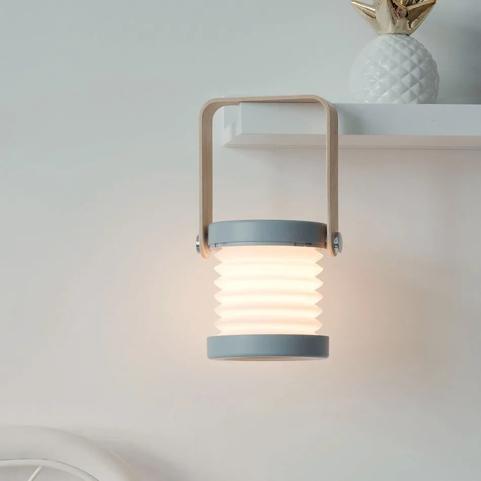 Lámpara de mesa portátil escandinava minimalista, recargable, plegable y con asa de madera