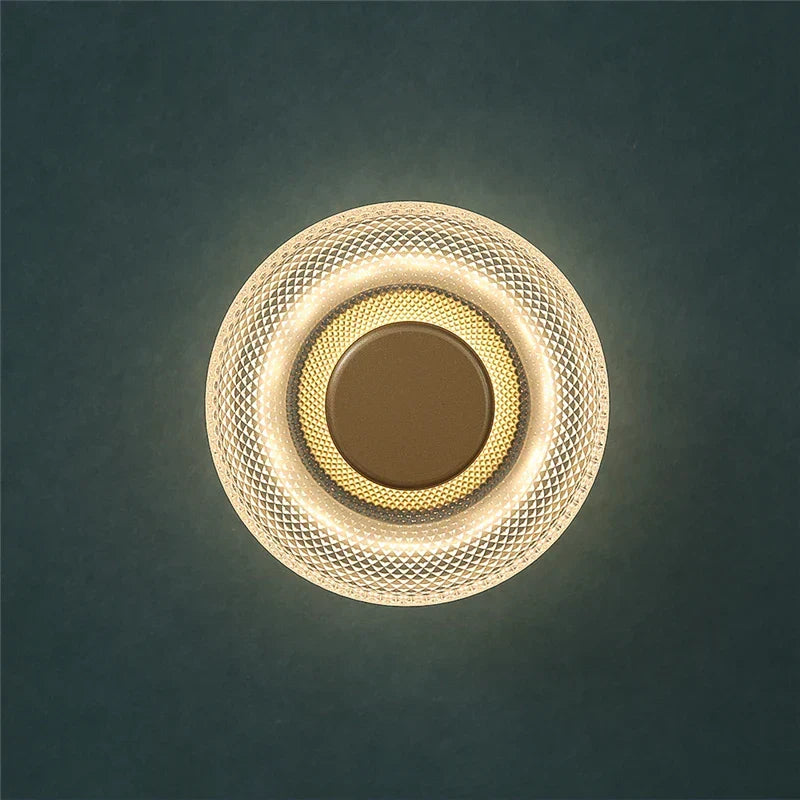 Aplique de pared escultórico de disco de vidrio texturizado y coloreado