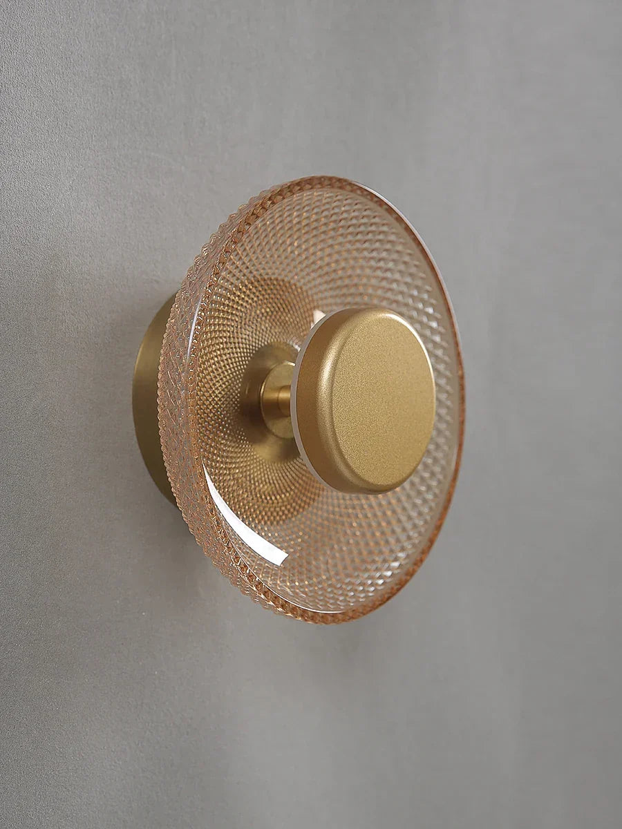 Aplique de pared escultórico de disco de vidrio texturizado y coloreado