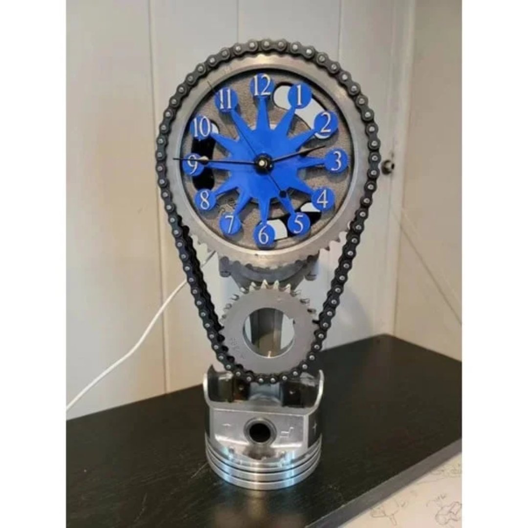 Reloj de pared silencioso industrial de metal y vidrio con mecanismo de engranajes expuesto
