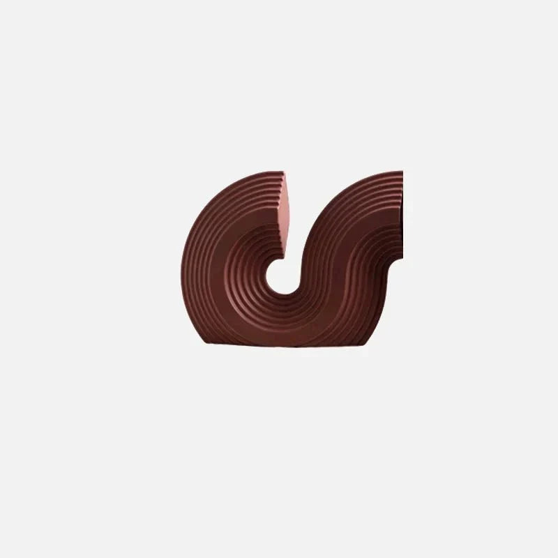 Juego de sujetalibros escultóricos de cerámica arqueada con textura acanalada