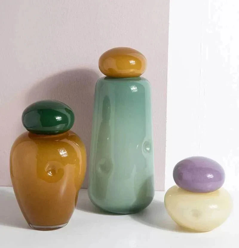 Jarrón de flores elíptico de vidrio brillante con tapa de guijarro