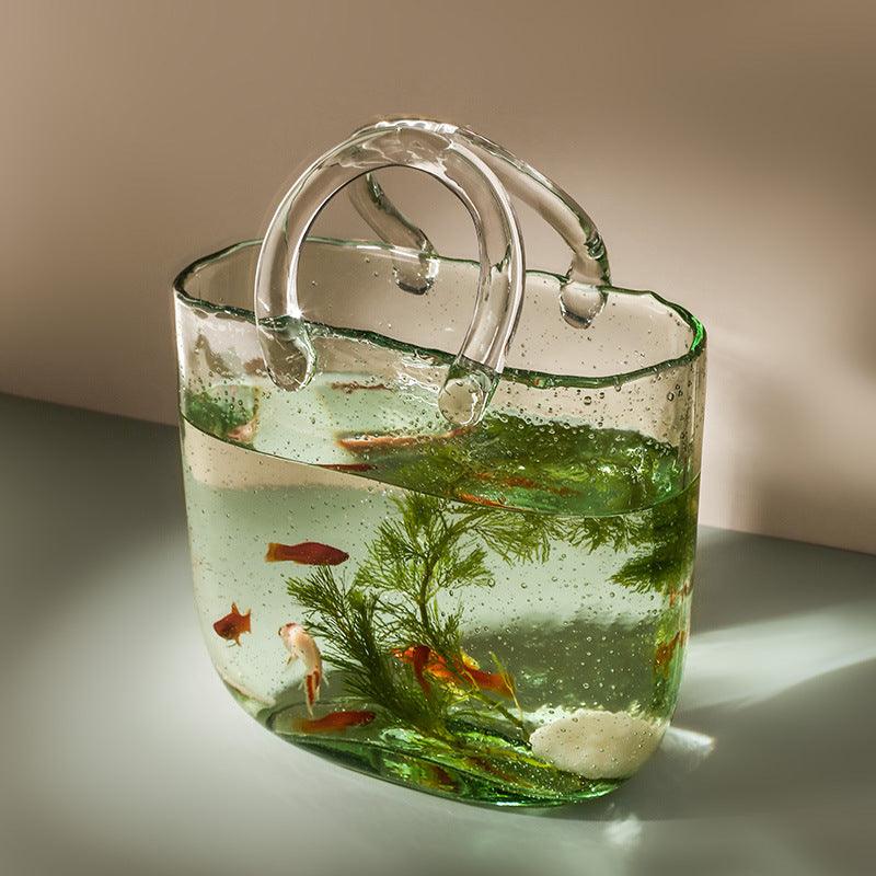 Jarrón decorativo de flores de vidrio transparente con silueta escultórica de bolso