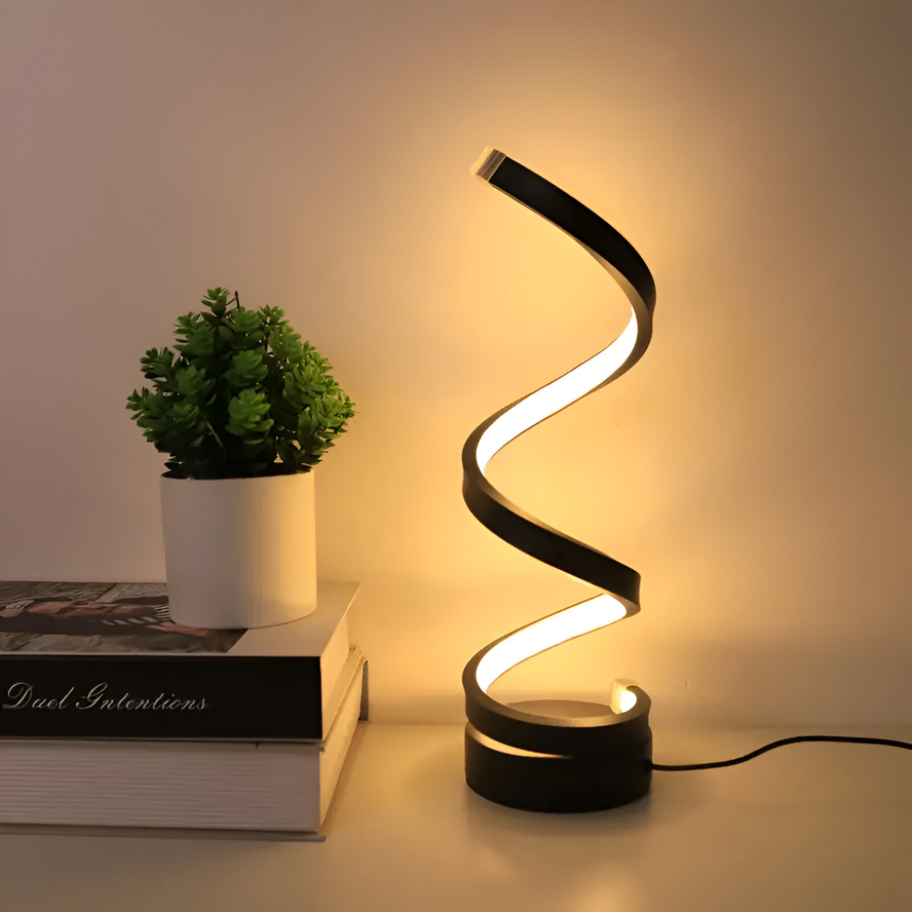 Lámpara de escritorio escultórica con pinza ajustable y diseño en espiral