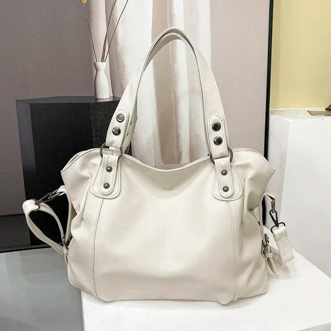 Bolso de hombro espacioso de cuero genuino con cierre de cremallera para mujer