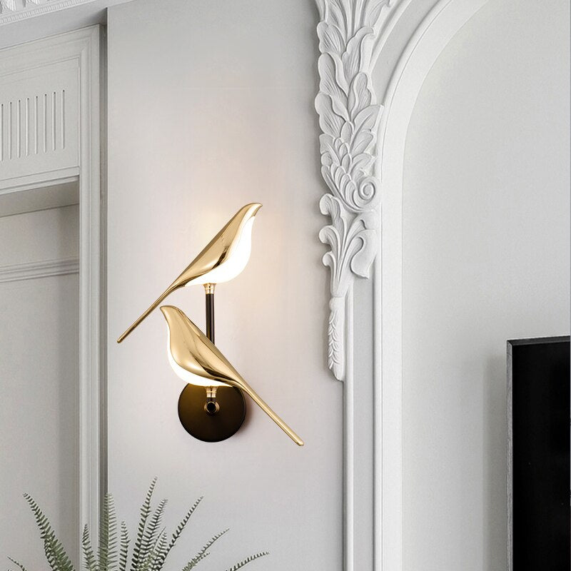 Aplique de pared magnético ajustable con silueta escultórica de pájaro