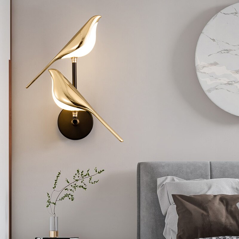Aplique de pared magnético ajustable con silueta escultórica de pájaro