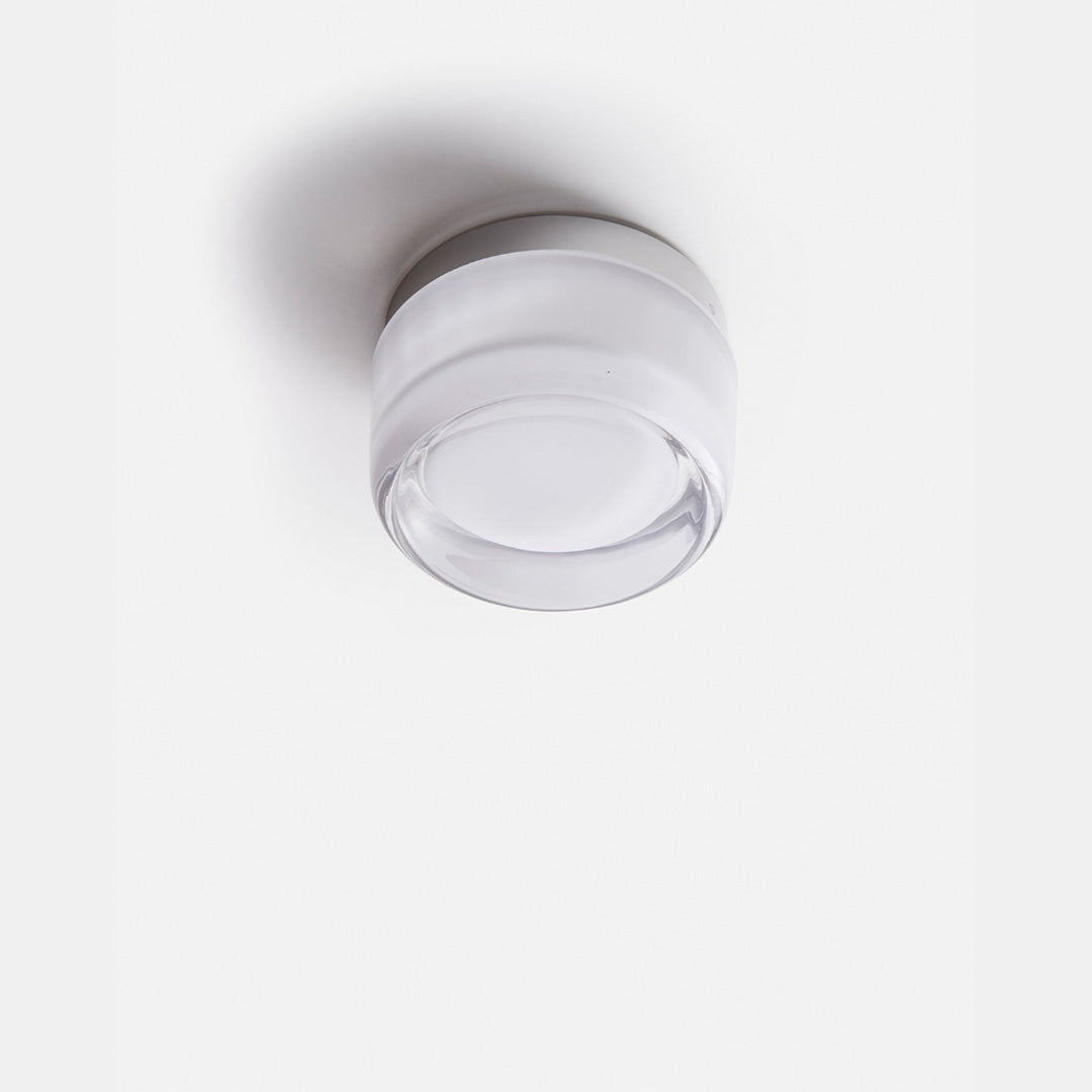 Lámpara de pared compacta de acrílico y aluminio con interruptor de botón