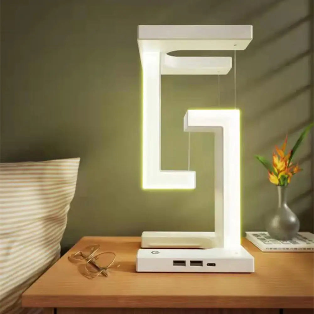 Lámpara de mesa con iluminación de zona flotante y carga inalámbrica