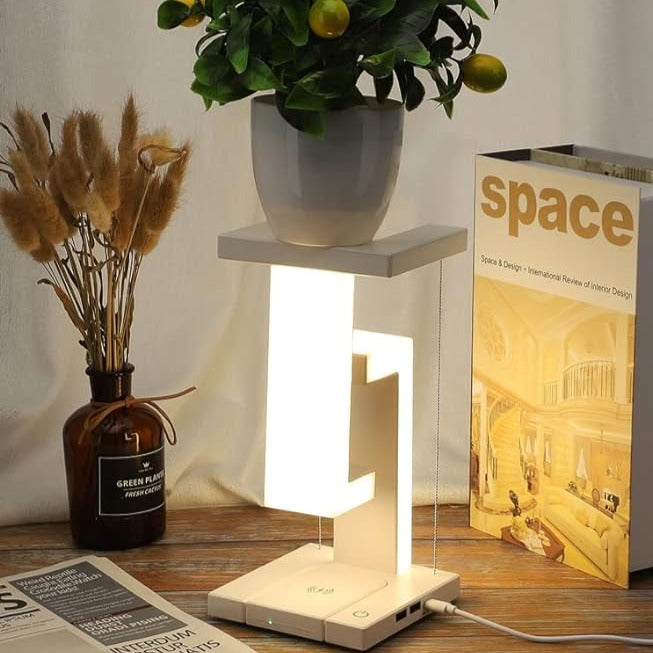 Lámpara de mesa con iluminación de zona flotante y carga inalámbrica
