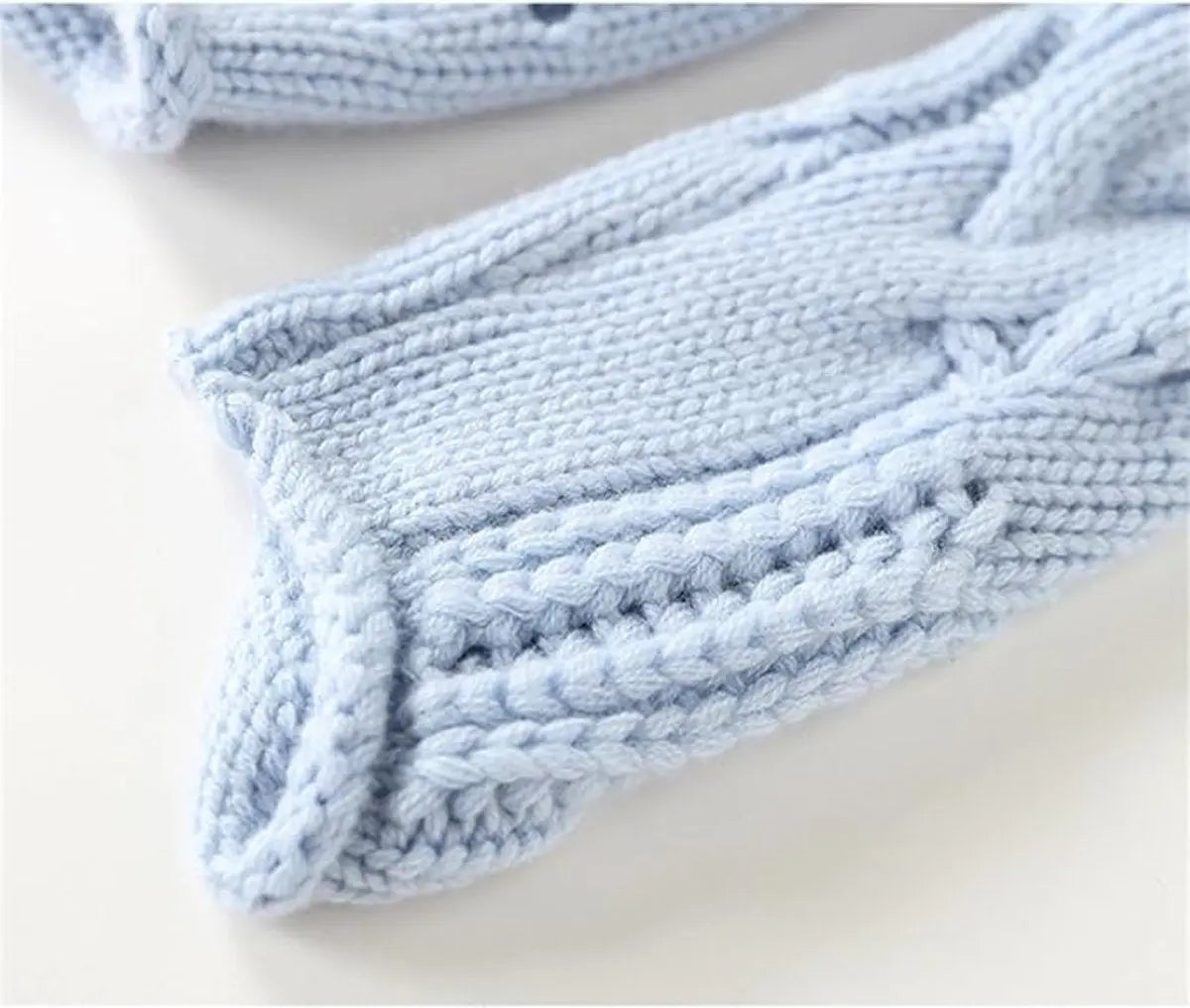 Jersey de punto trenzado para mujer con cuello alto y corte holgado