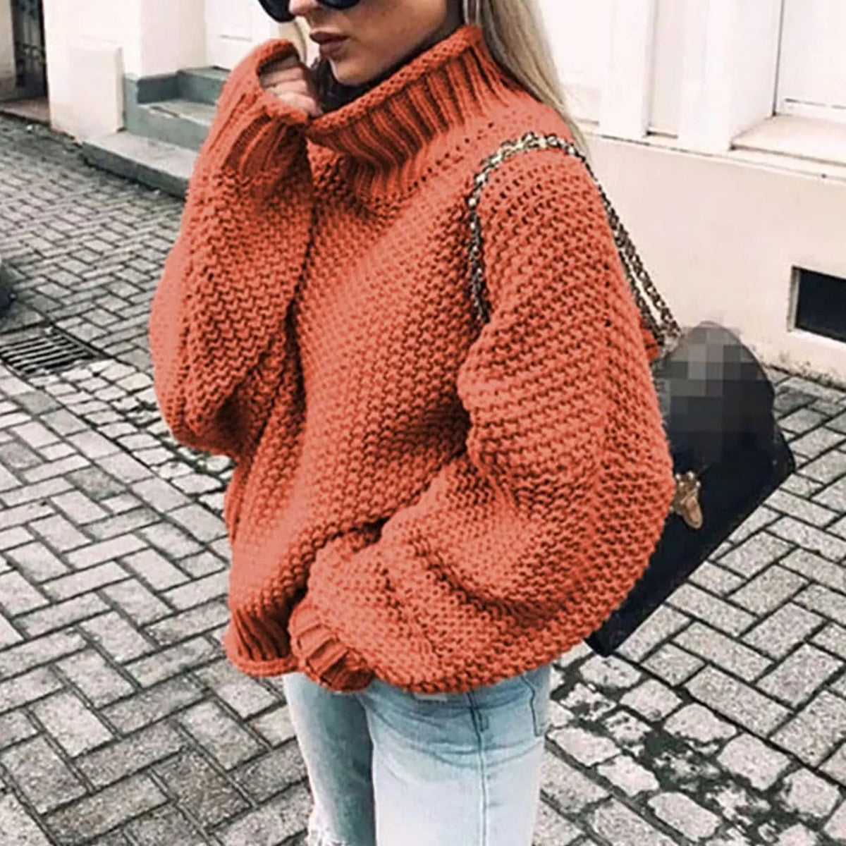 Jersey oversize de punto grueso para mujer con cuello alto