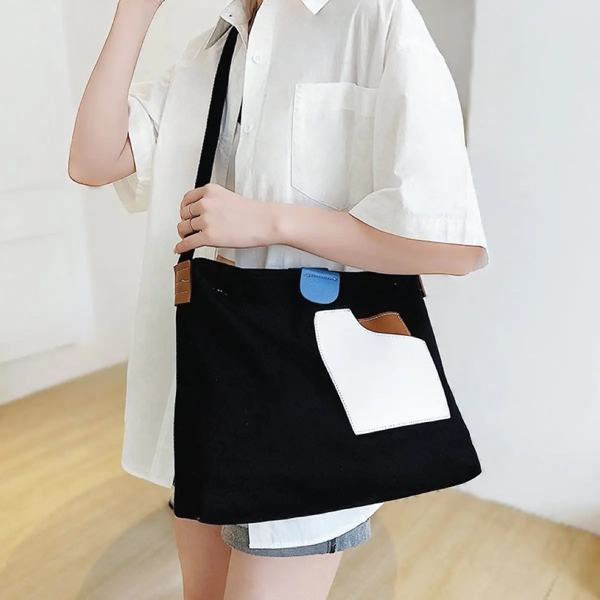 Bolso tote de lona para mujer con bloques de color, bolsillo de cuero PU y asa para el hombro