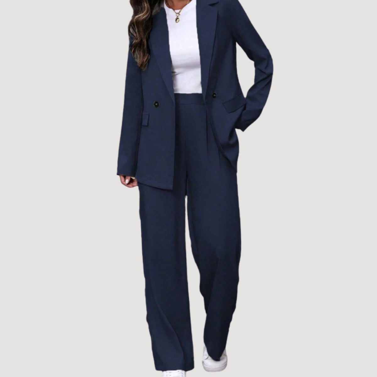 Traje de pantalón de mujer de sastrería con doble botonadura y pierna ancha