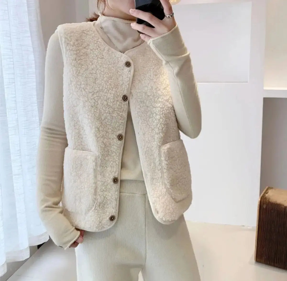 Chaleco acolchado de forro polar sherpa con botones para mujer