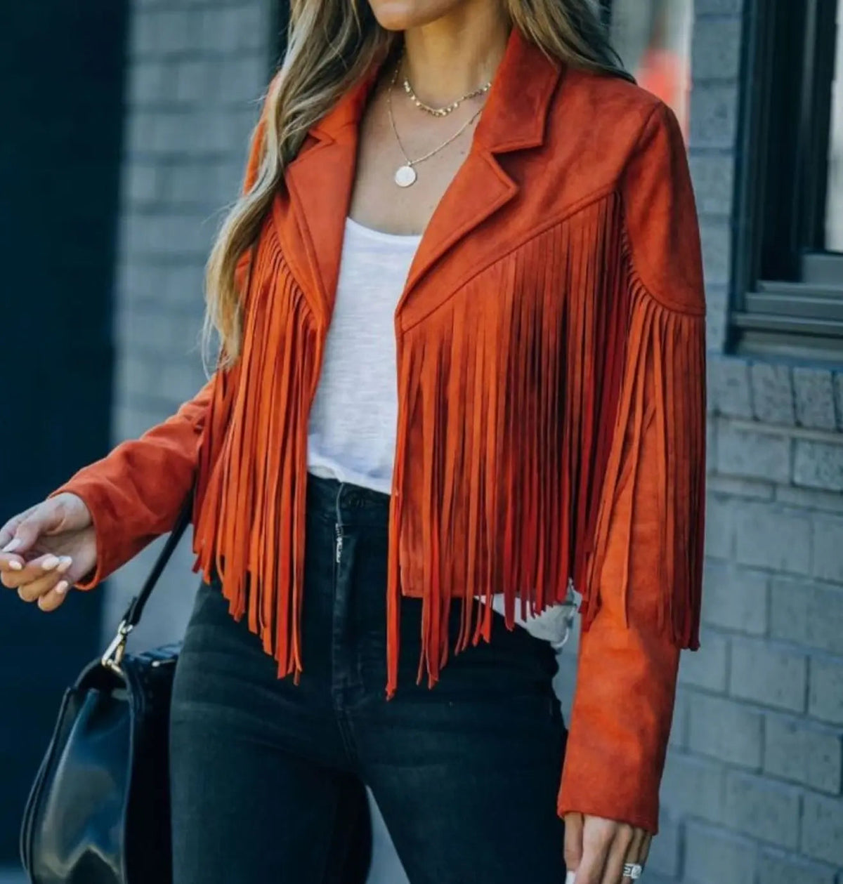 Chaqueta motera corta de ante con flecos para mujer