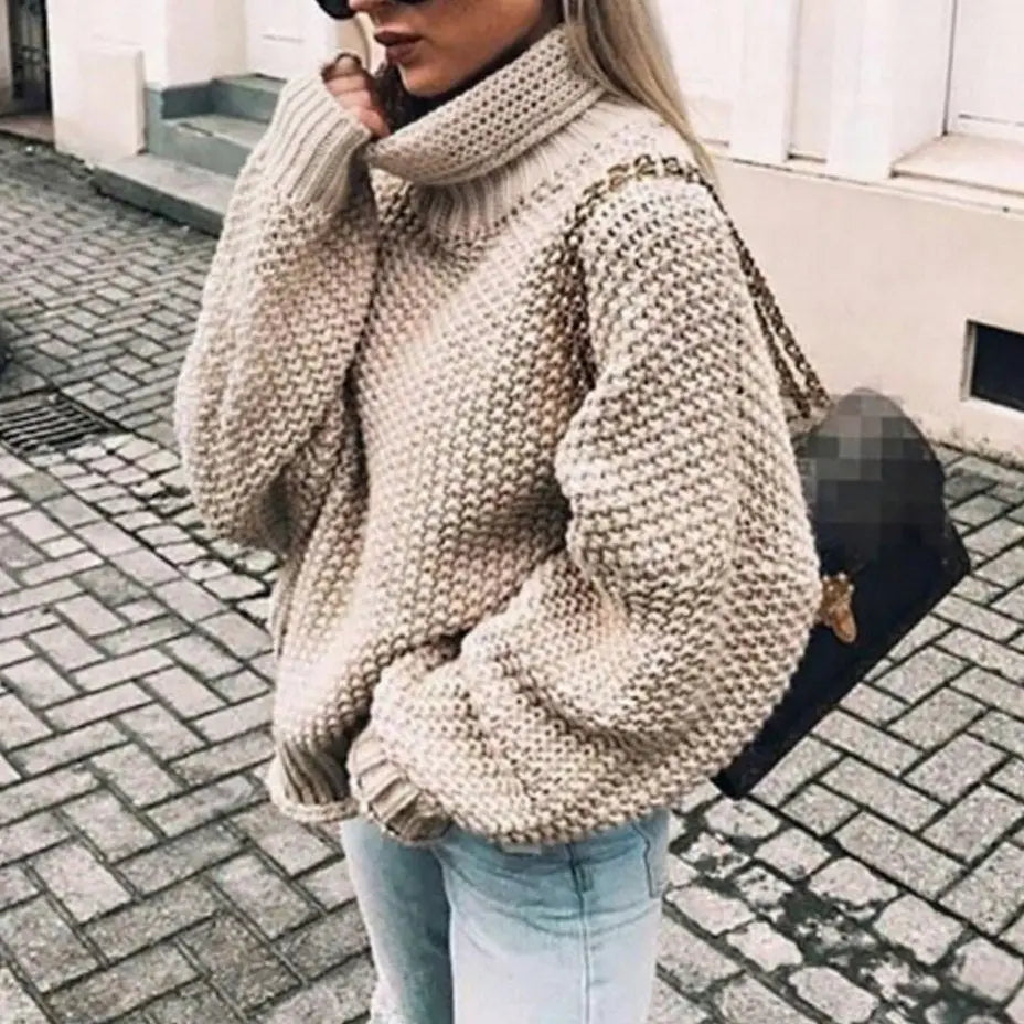 Jersey extragrande de punto grueso con cuello alto y mangas abullonadas para mujer