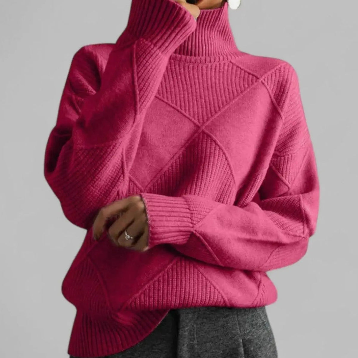 Suéter extragrande de punto de rombos con cuello alto para mujer