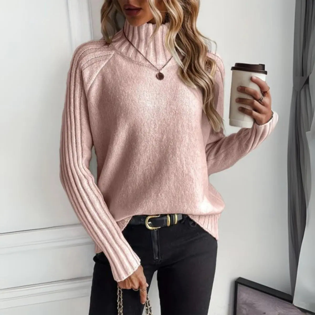 Jersey de punto acanalado de cuello alto y corte holgado para mujer