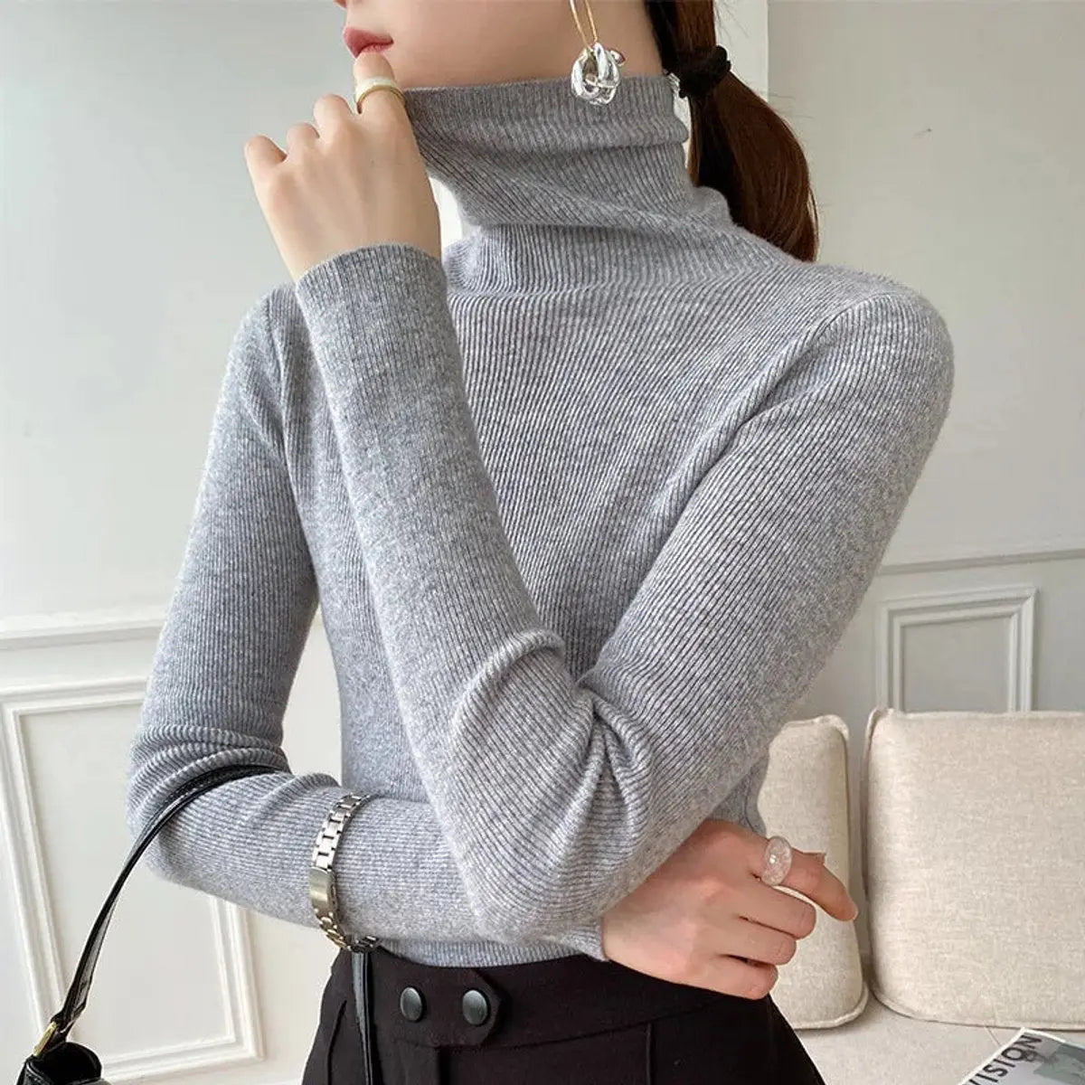 Jersey de cachemira de corte entallado y cuello alto para mujer