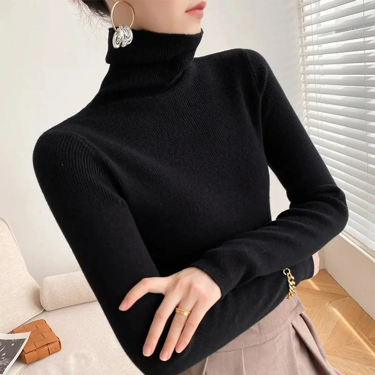 Jersey de cachemira de corte entallado y cuello alto para mujer