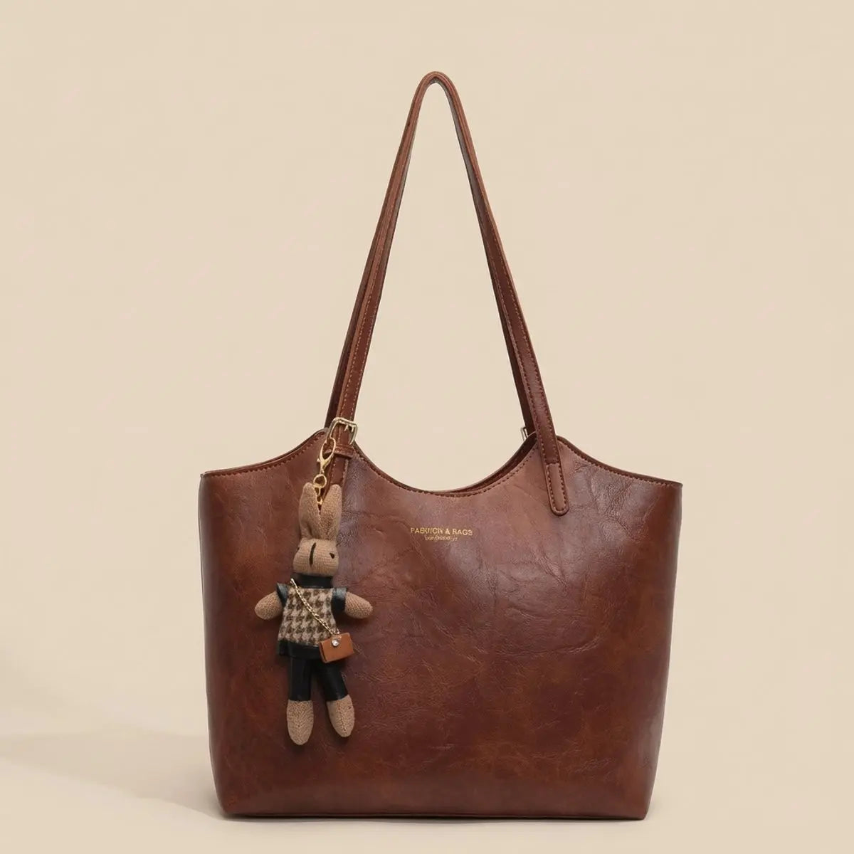 Bolso tote de hombro de cuero vegano para mujer con adorno de conejito de felpa