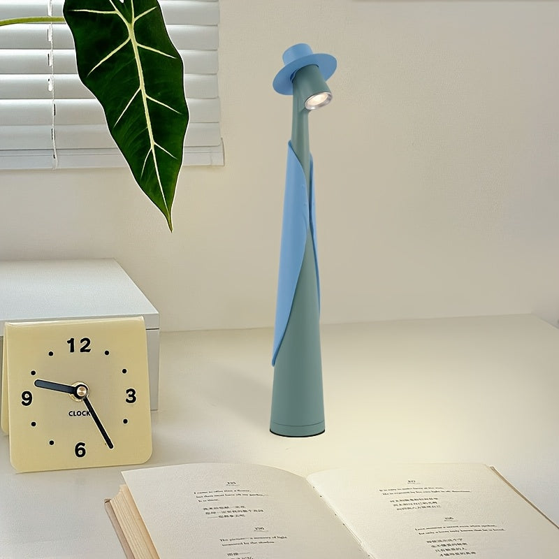 Lámpara de mesa escultórica con silueta de sombrero, recargable y con control táctil