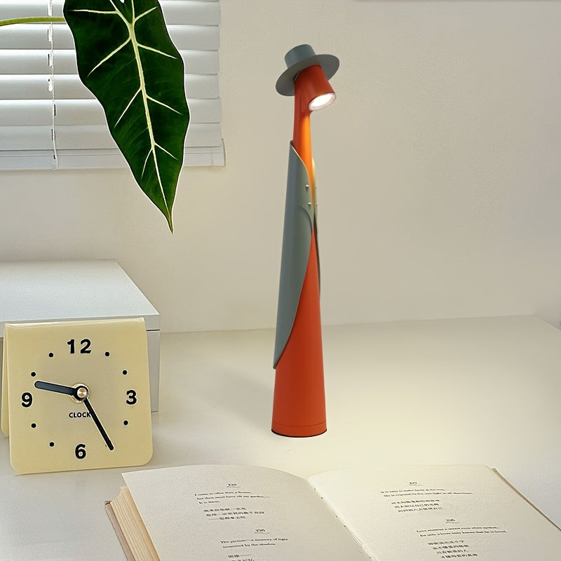 Lámpara de mesa escultórica con silueta de sombrero, recargable y con control táctil