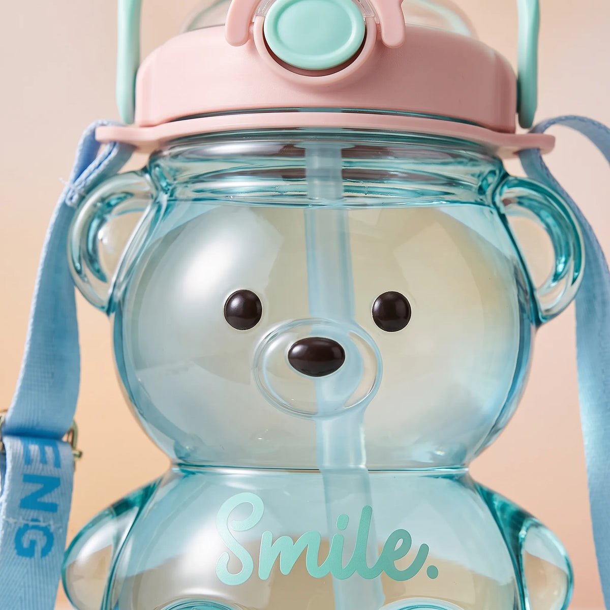 Botella de agua infantil transparente con forma de oso, diseño divertido y correa