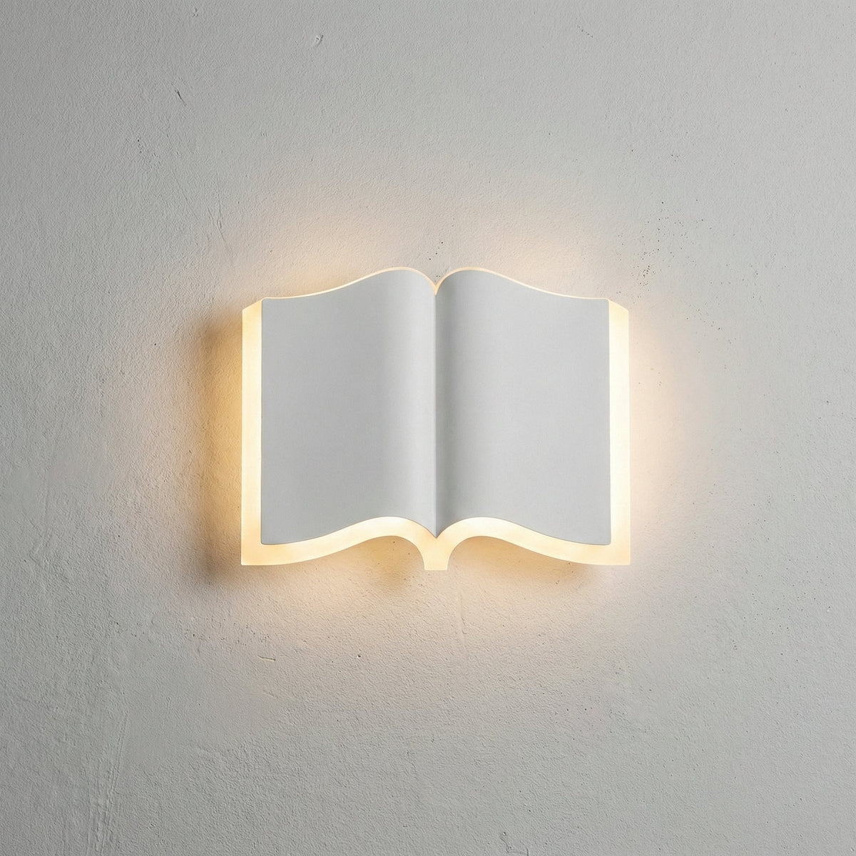 Lámpara de pared escultórica de hierro y acrílico con silueta de libro abierto