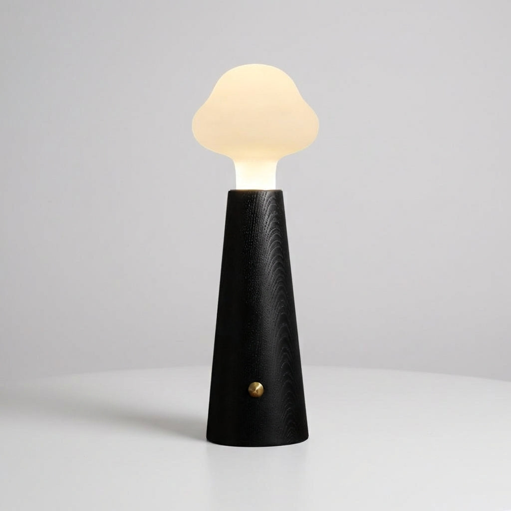 Lámpara de mesa con pantalla acrílica en forma de nube, base cónica y luz difusa