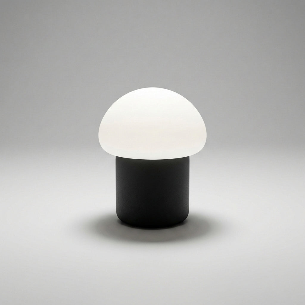 Lámpara de mesa minimalista compacta con silueta de champiñón y base con peso