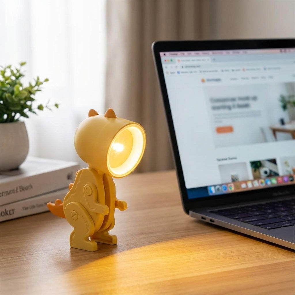 Lámpara de mesa portátil compacta con personaje de dinosaurio plegable y apta para sujetar con pinza