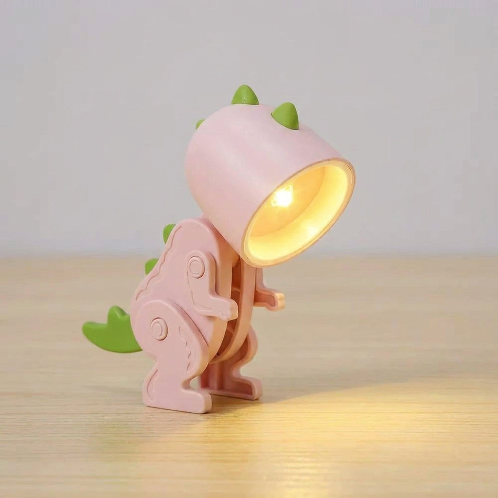 Lámpara de mesa portátil compacta con personaje de dinosaurio plegable y apta para sujetar con pinza