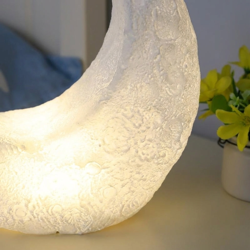 Lámpara de mesa art déco con silueta de media luna, pantalla mate y sin cable