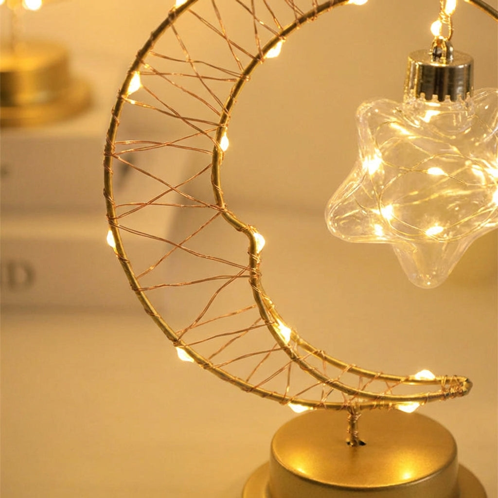 Lámpara de mesa regulable con silueta de luna curva y estrella de vidrio colgante