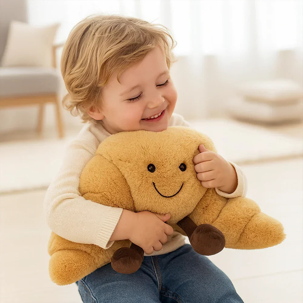 Juguete de peluche y cojín abrazable con forma de tostada de pretzel y cruasán redondeado
