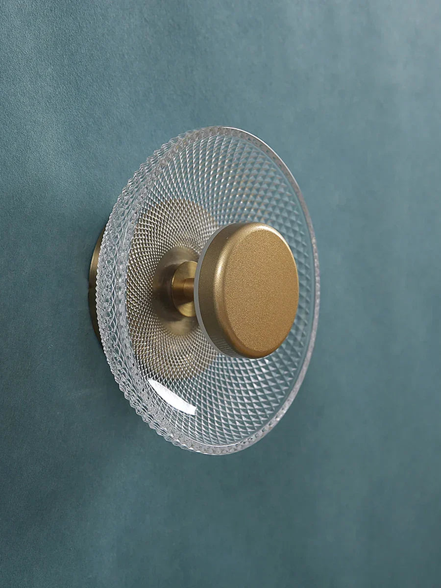 Aplique de pared escultórico de disco de vidrio texturizado y coloreado
