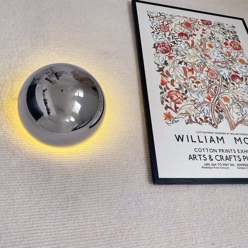 Lámpara de pared escultórica redonda metálica Bauhaus con halo de eclipse