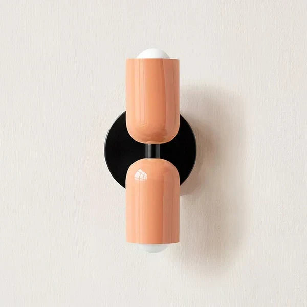 Lámpara de pared de resina y metal con dos cabezales ajustables